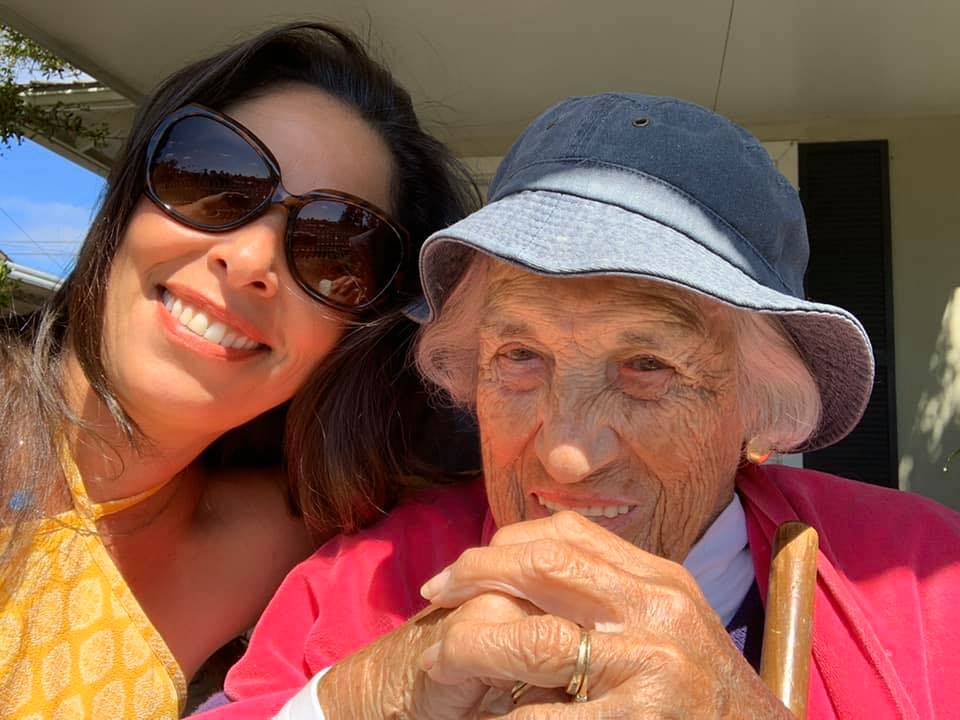 Image of Cynthia caring for elder.